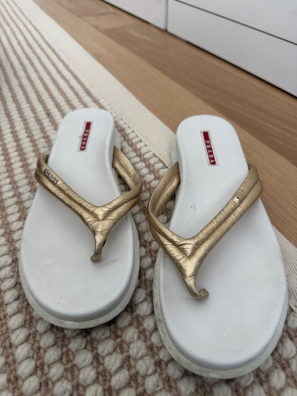 Prada Metallic Gold Leather Thong Sandals with White Footbed